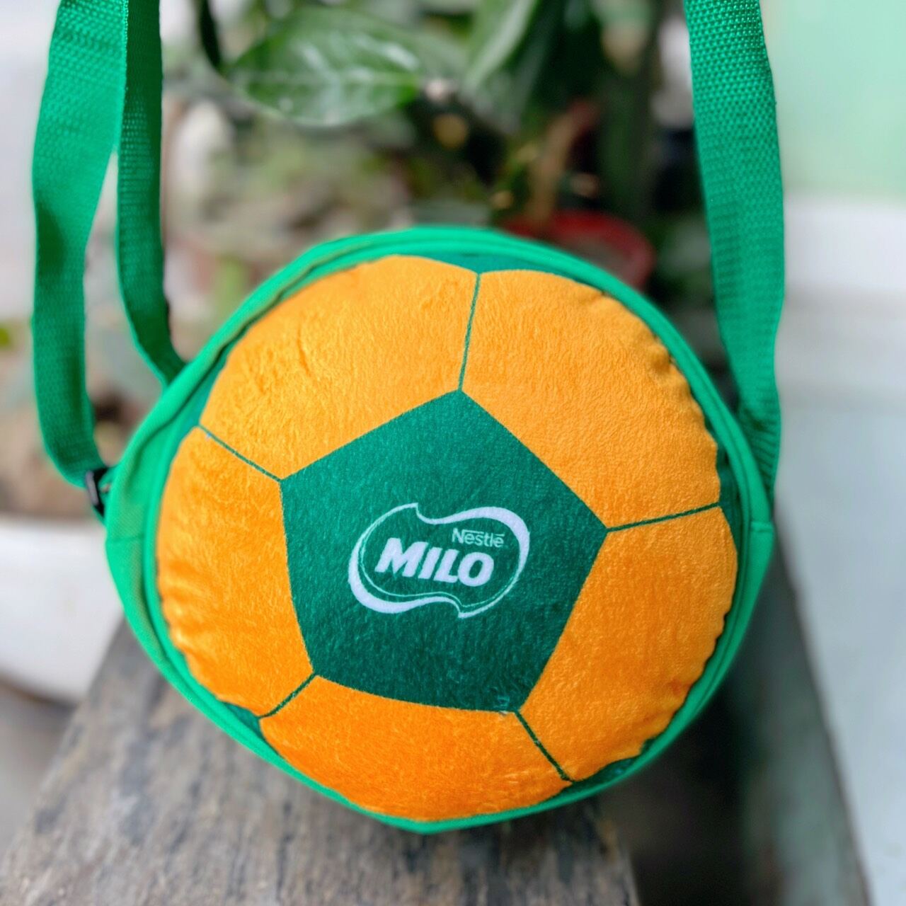 TÚI đeo chéo hình quả bóng milo