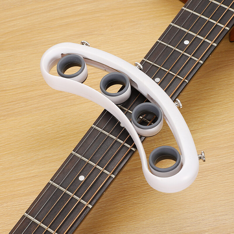 Thiết bị luyện ngón tay guitar thiết bị luyện ngón tay dụng cụ hỗ trợ luyện tay thiết bị giãn ngón tay tay trái thiết bị luyện tập đàn piano túi guitar
