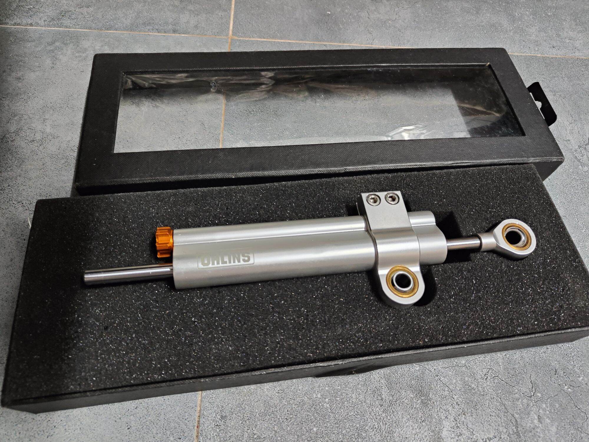 Trợ lực cổ Ohlins gắn mọi dòng xe (dream wave sirius exciter winner satria sonic raider jupiter taurus elegant galaxy...)