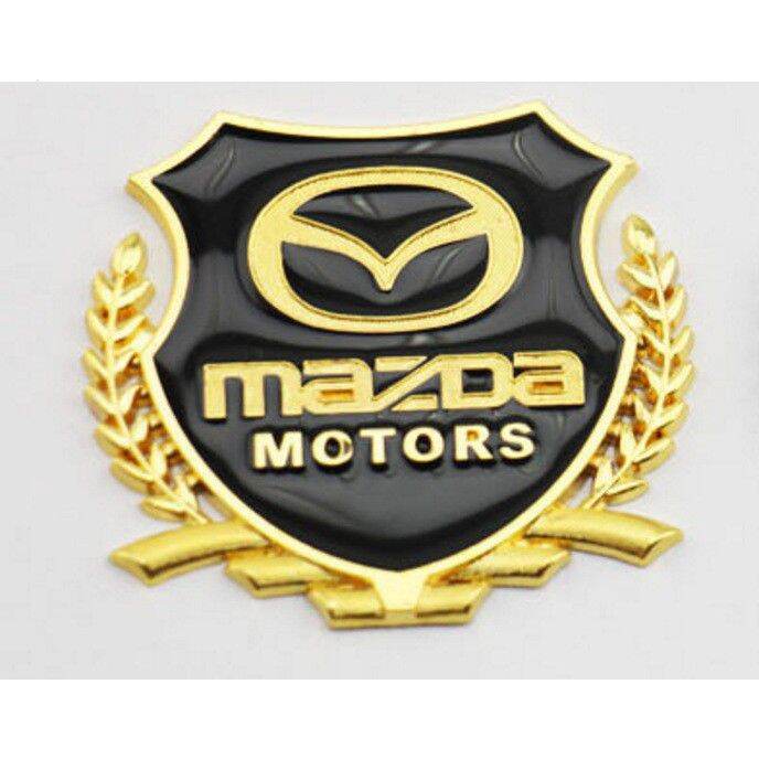 Logo bông lúa chất liệu hợp kim đồng hãng xe MAZDA