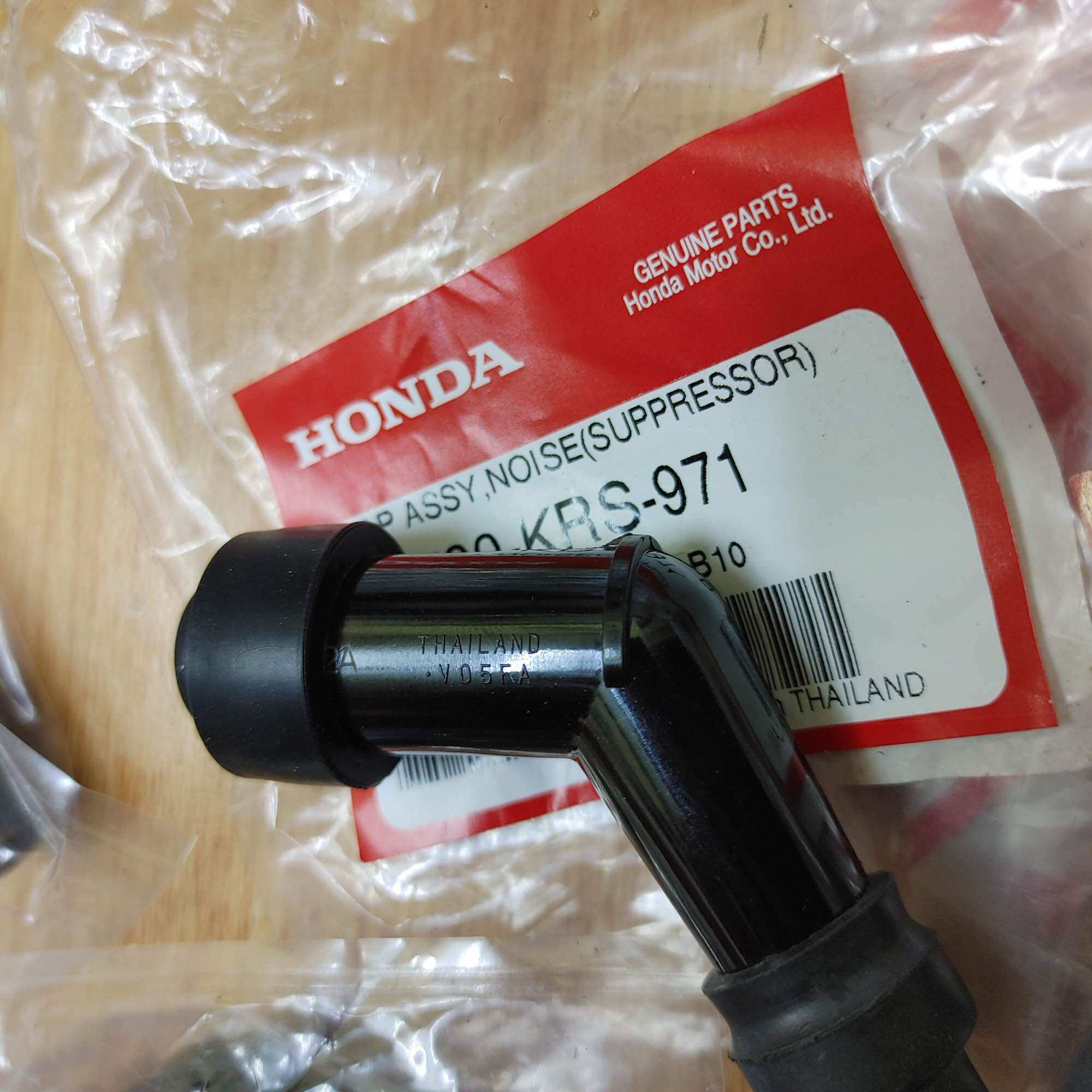 Chụp bugi xéo 110 Thái  NGK
