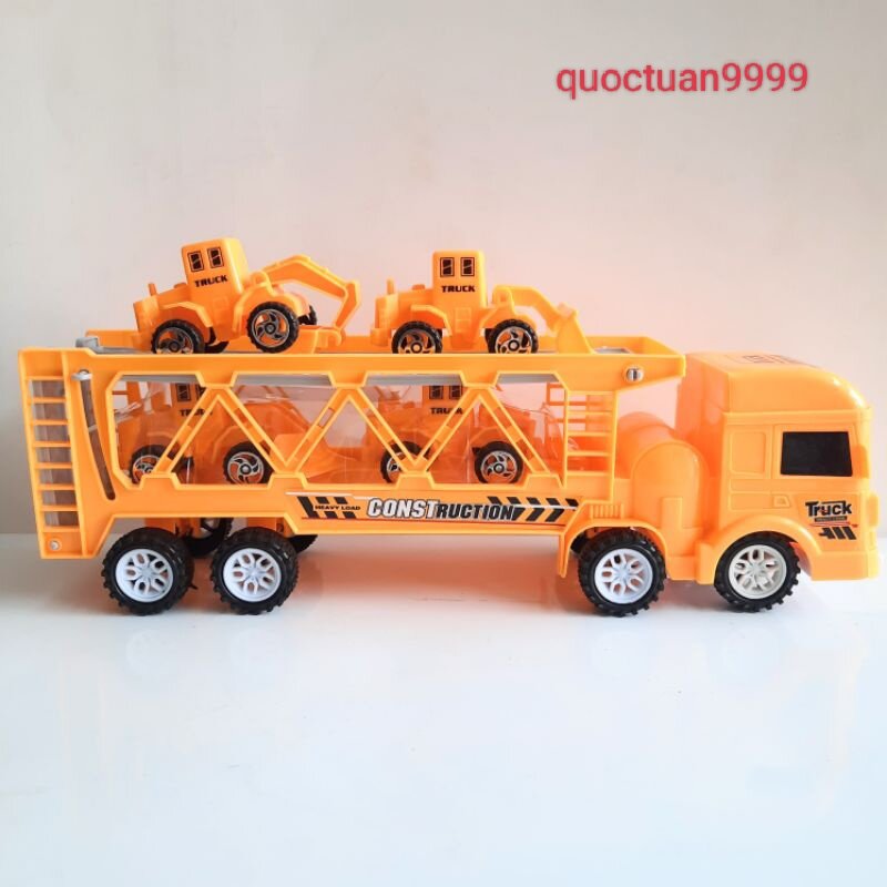 Hộp xe Container chở 4 xe công trình (chạy trớn)