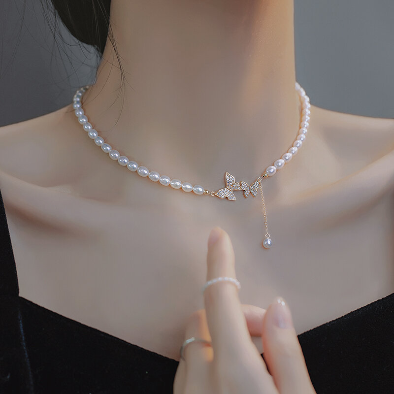 Dây chuyền ngọc trai nước ngọt tự nhiên mặt dây chuyền con bướm nữ dây chuyền choker cổ điển cảm giác cao cấp thiểu số không xa xỉ dây chuyền xương đòn