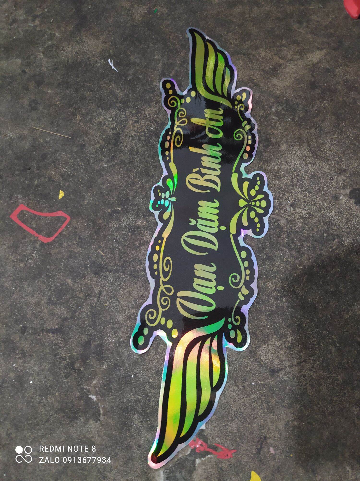 Tem decal vạn dặm bình an lấp lánh vàng đen bảy màu trang trí xe