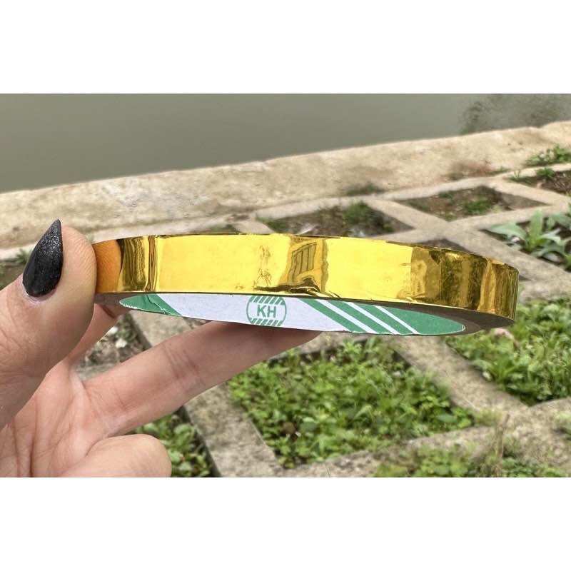 1 cuộn băng keo bản 1cm-2cm vàng / bạc 20 mét