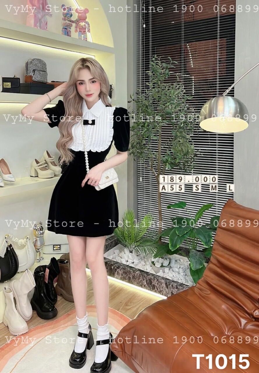 Đầm yếm xoè phối nơ xinh lung linh