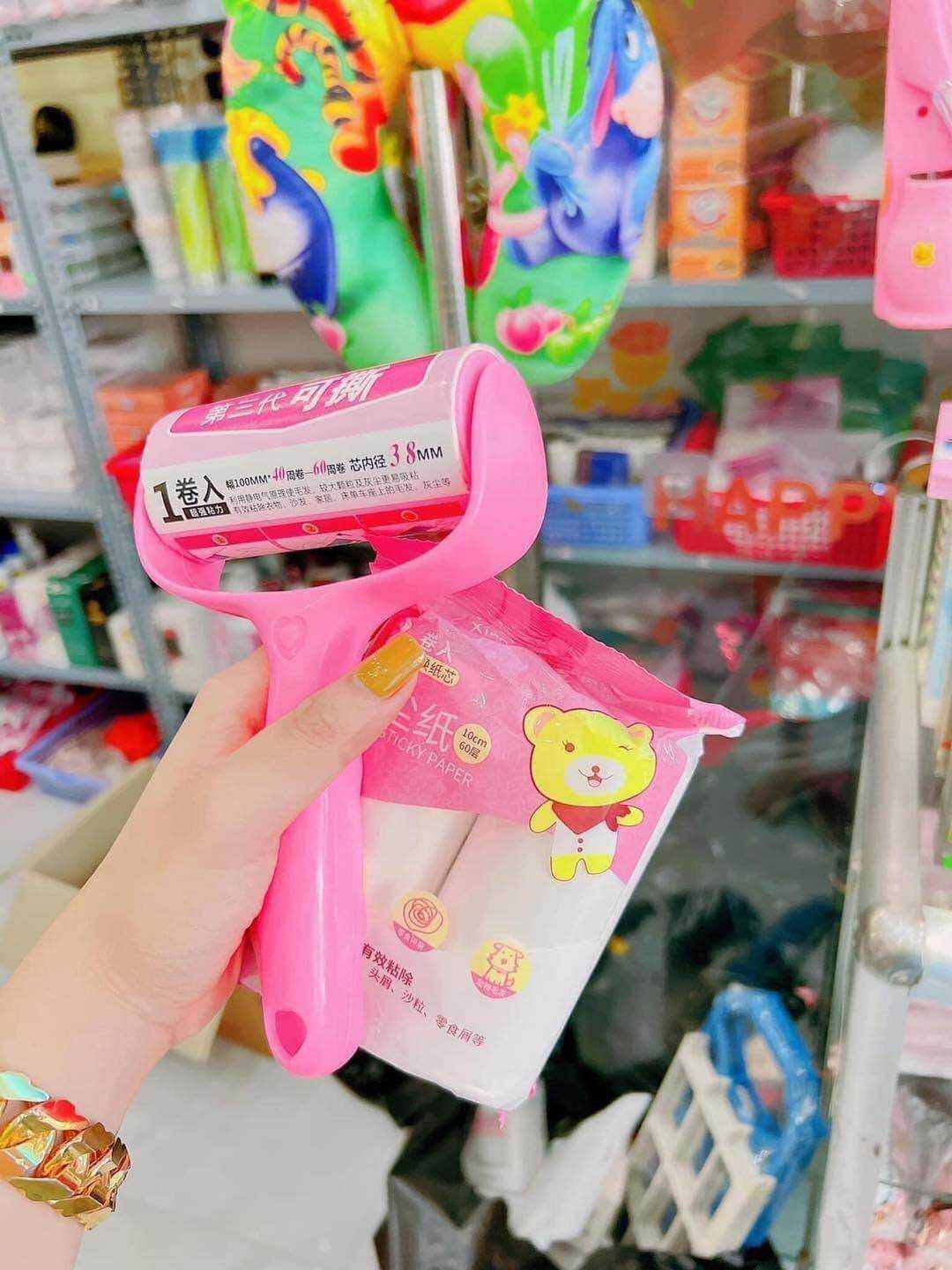 Con lăn bụi quần áo . Con lăn đa năng làm sạch đồ