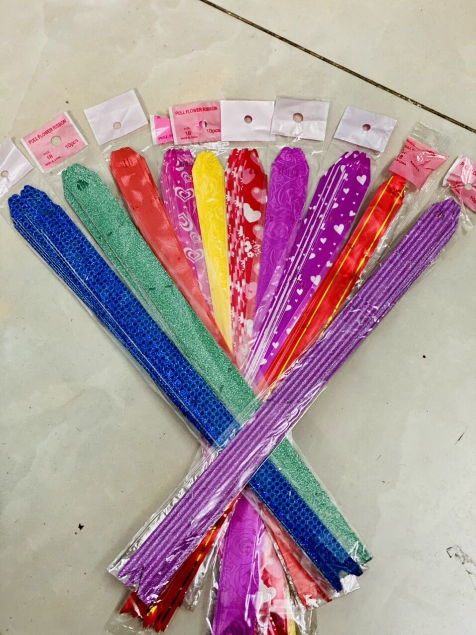 Sét nơ rút 10 nơ. Kích thước nơ ngang 7 dài 10 cm rút rồi