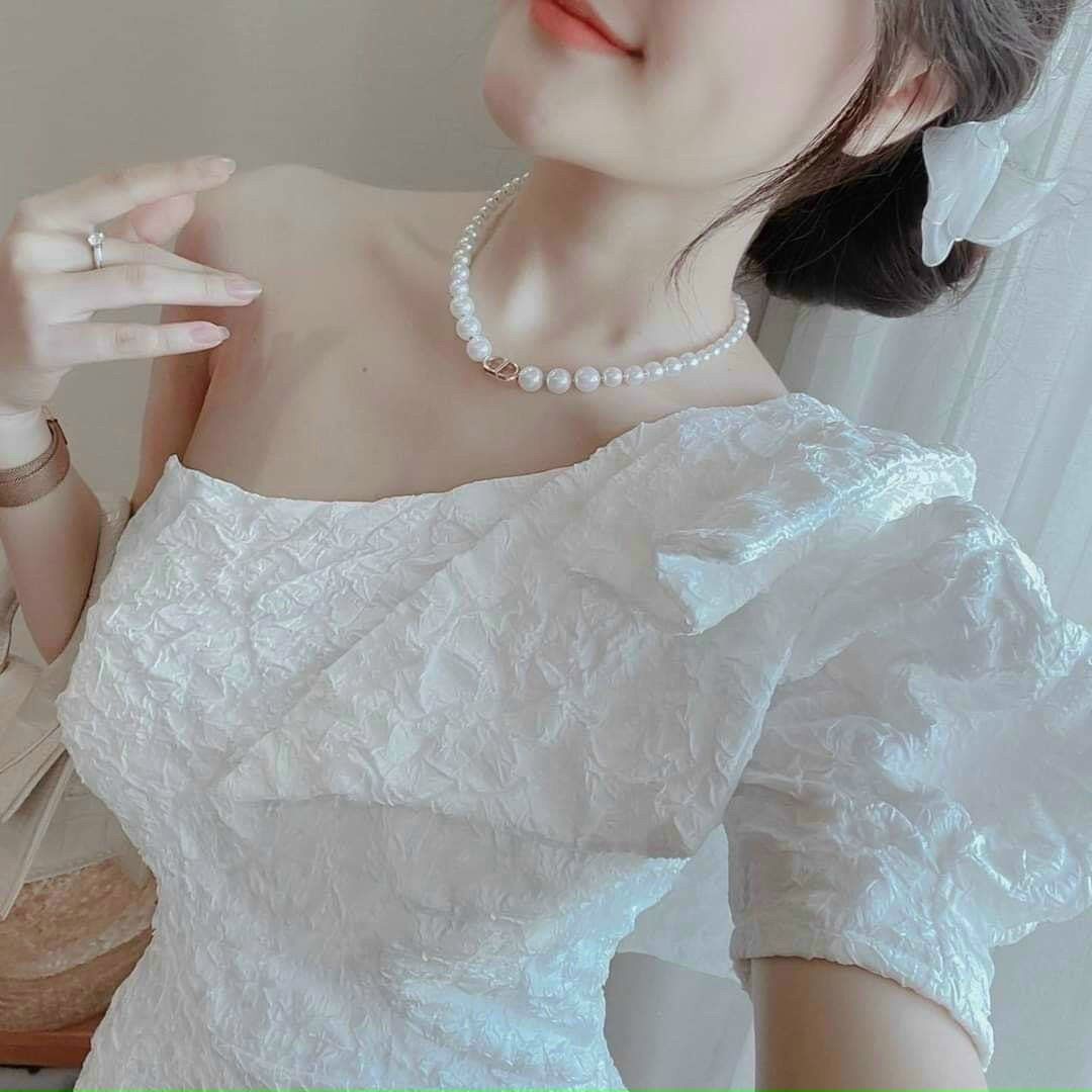 Đầm gấm lệch vai