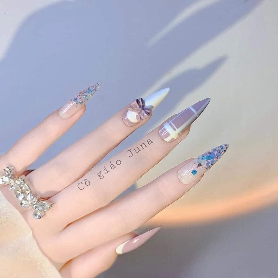 Bạn muốn có bộ nails đẹp và độc đáo khác người? Hãy xem mẫu nail đẹp có nơ mới nhất của năm