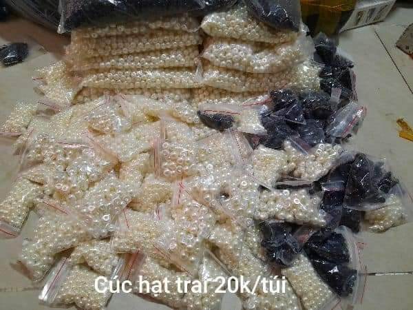 Cúc hạt trai màu trắng ngà khâu áo