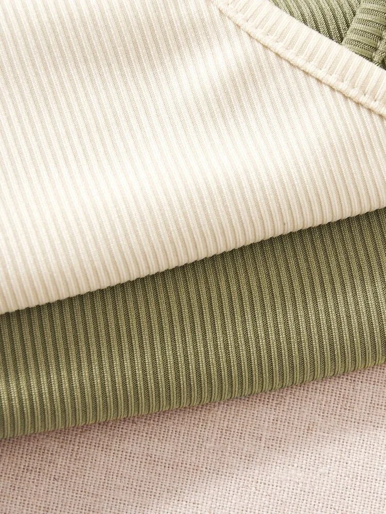 Áo croptop phối hai màu đan chéo ( xanh cốm + sữa )