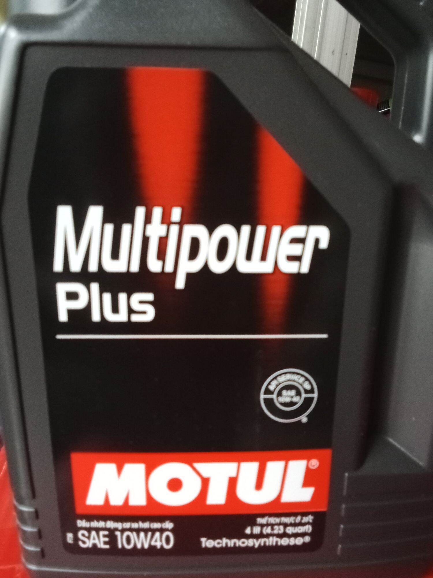 Dầu nhớt Motul Multipower Plus 10W40 (4 lít) chuyên dùng cho xe ôtô, mua một thùng tặng áo Motul