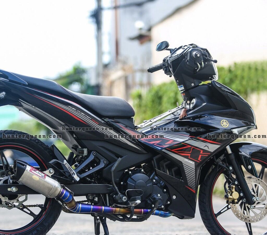 TEM TRÙM EXCITER 150 MX ĐỎ ĐEN