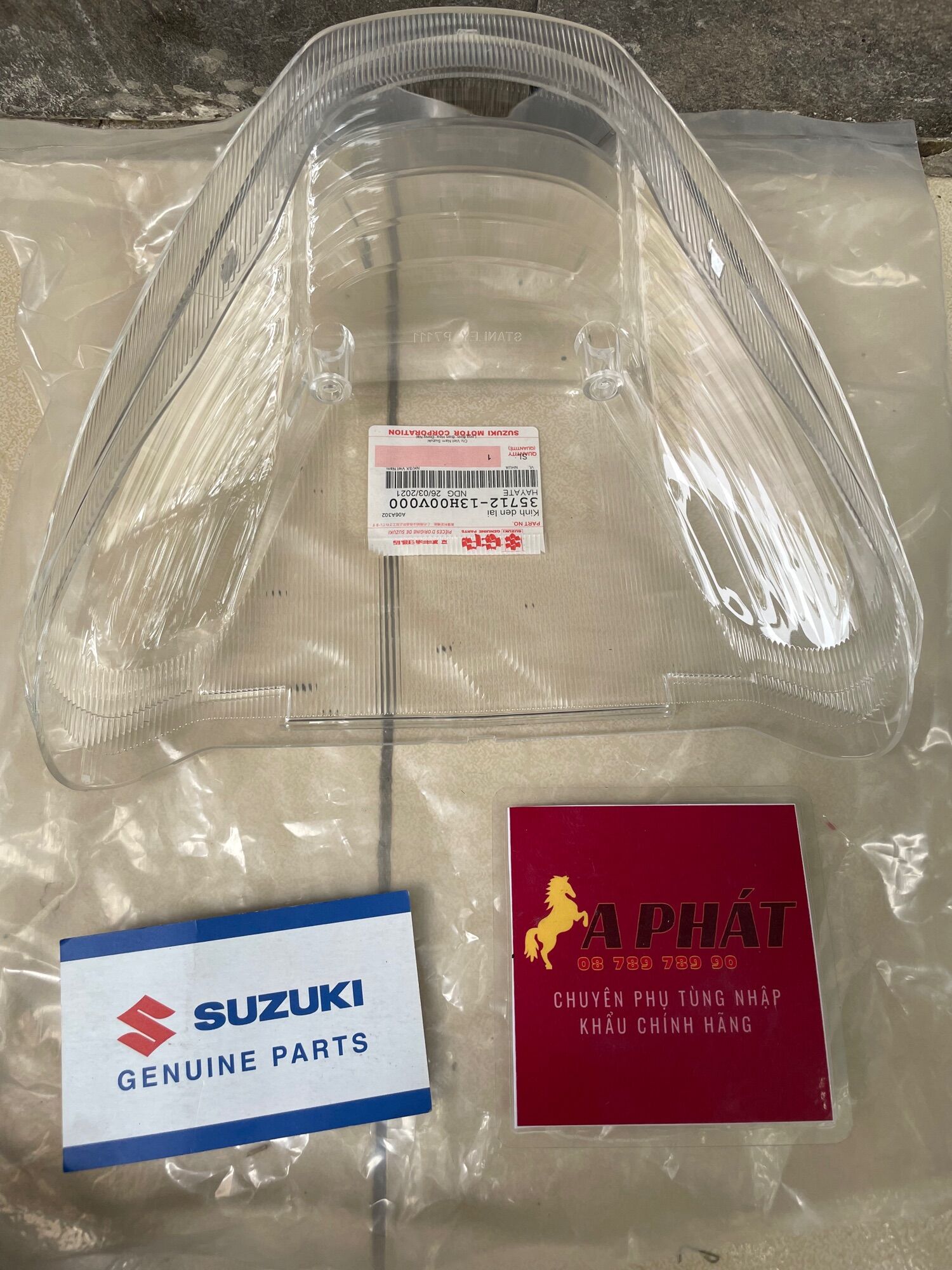 Kính đèn lái suzuki hayate