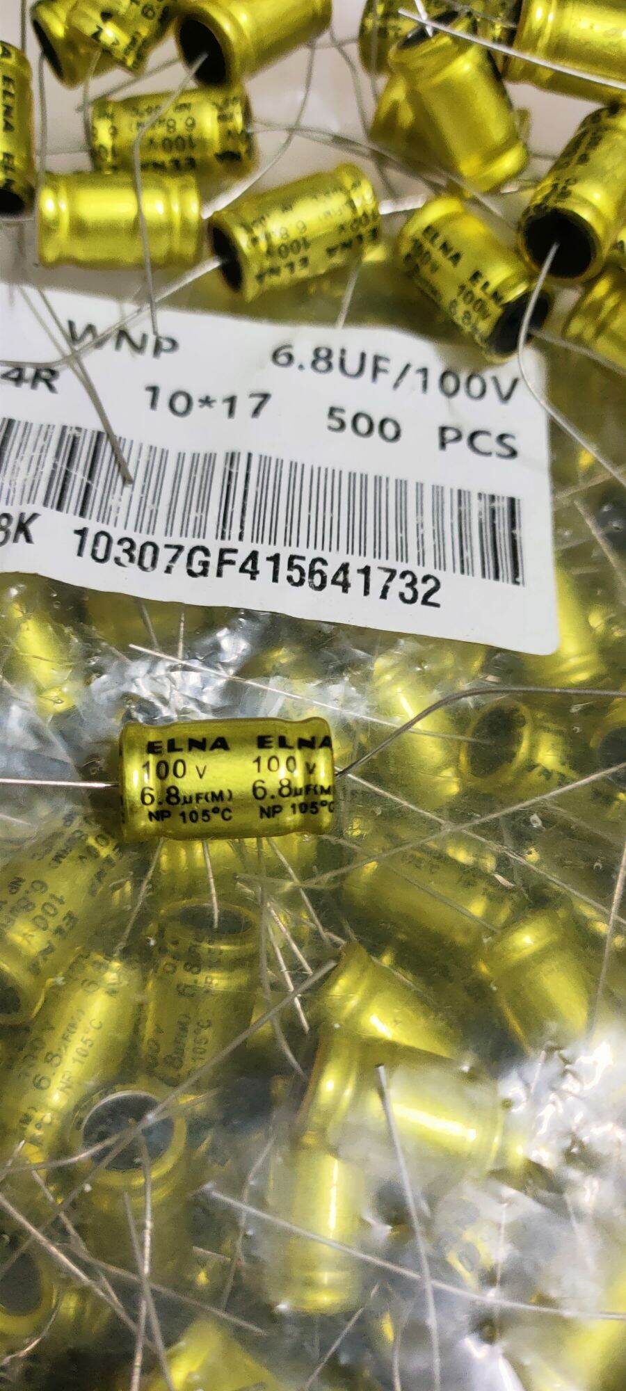 10 Tụ loa 2 đầu 6.8uf 100v màu vàng