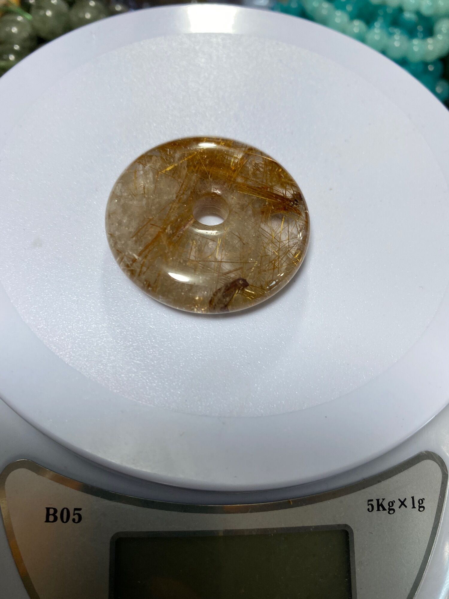 Mặt dây chuyền đồng điếu thạch anh tóc vàng ánh kim 2,5cm. Hợp mệnh thổ và kim.
