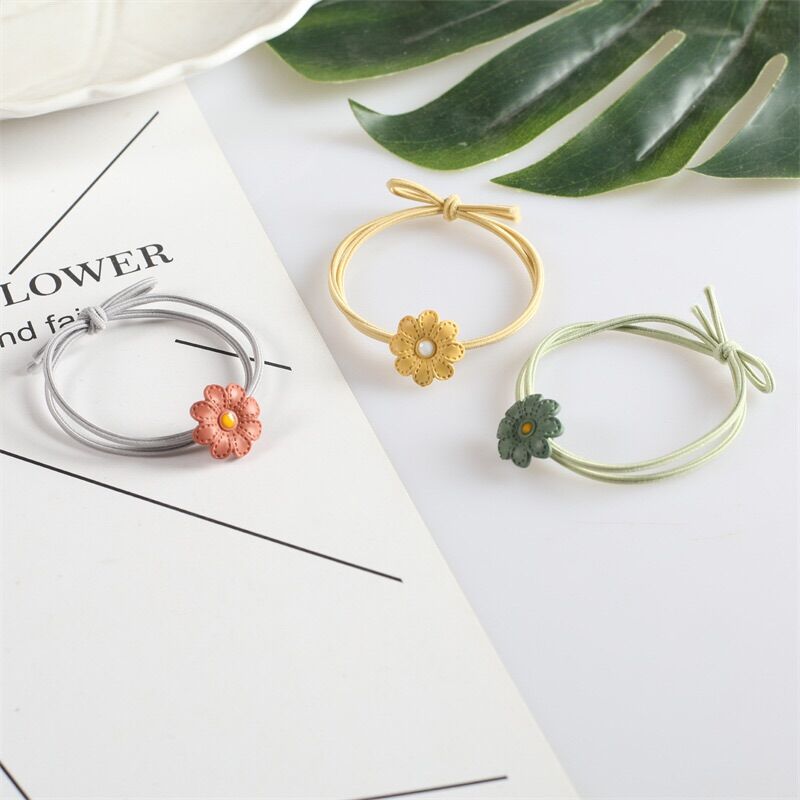 Set 100 dây buộc tóc hình bông hoa xinh xắn