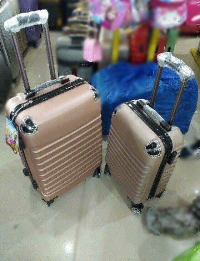 valy du lịch tay kéo có bánh xe