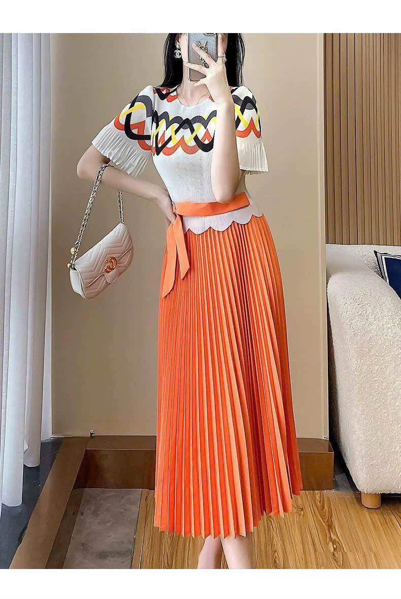 Váy đầm lụa dập ly thắt nơ điệu đà