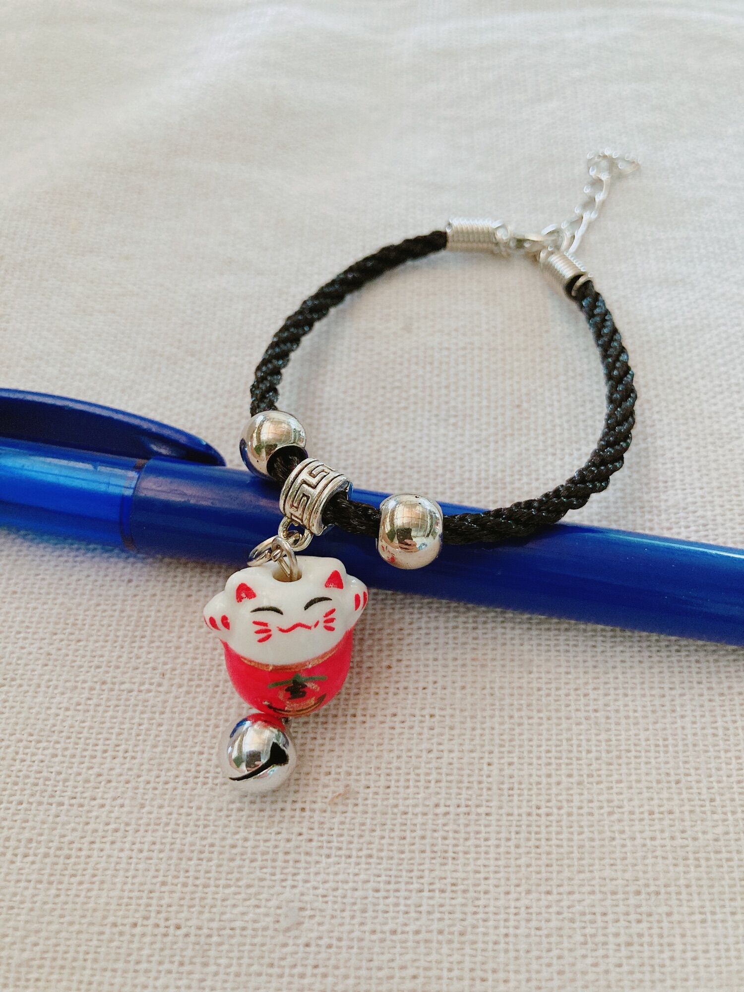 Vòng tay mèo maneki neko gốm sứ