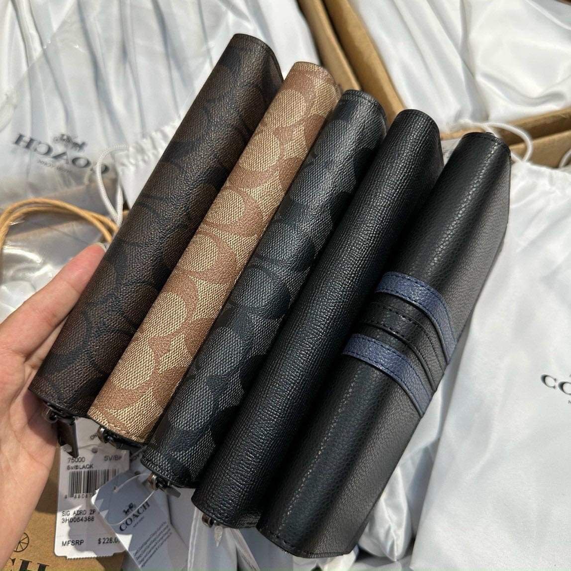Ví dài cầm tay C0.ach unisex