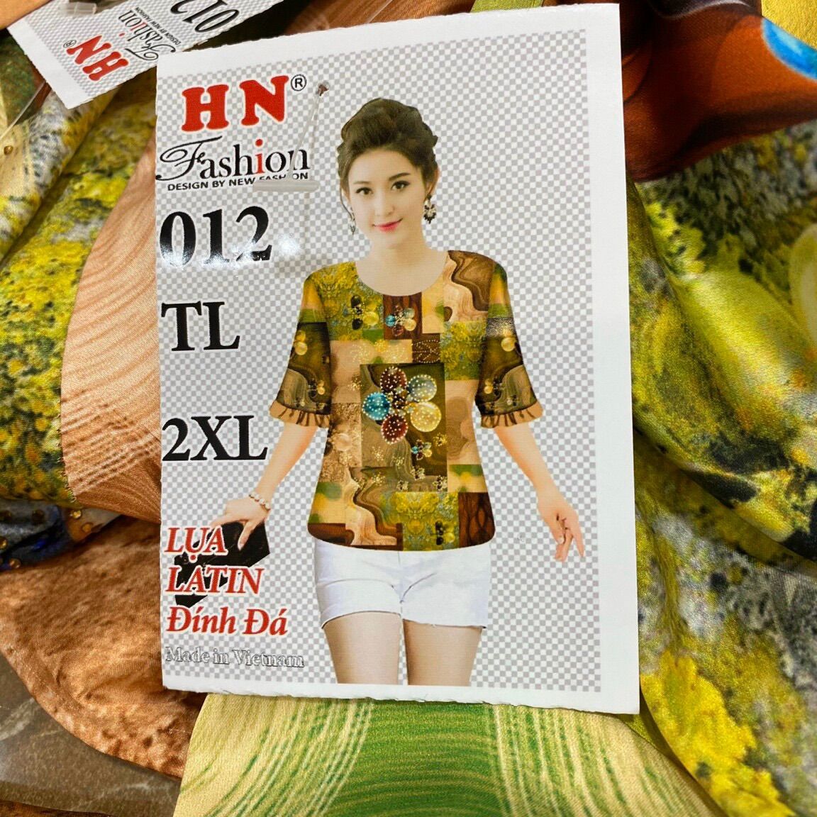 Áo nữ vải lụa đính đá 48-65kg