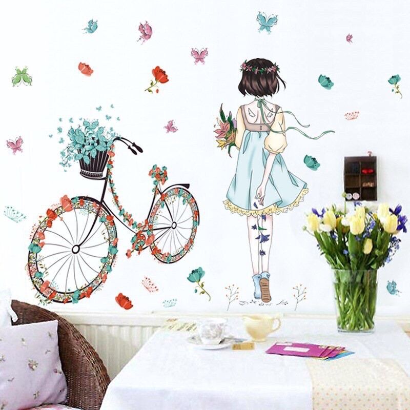 Decal dán tường cô gái xe đạp và hoa đào