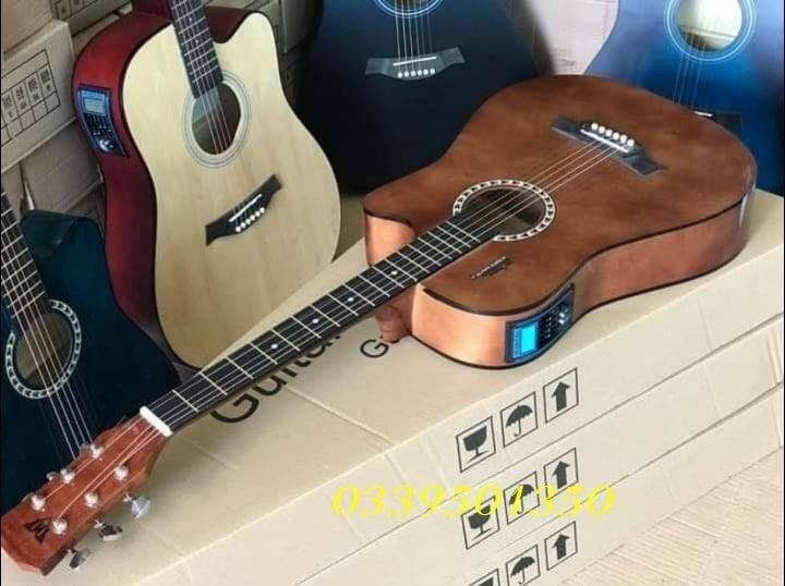 Đàn guitar acoustic TNT đàn T70 giá 1tr100k giá gốc shop giảm giá 750k Đàn T70 size 38 dài 96cm