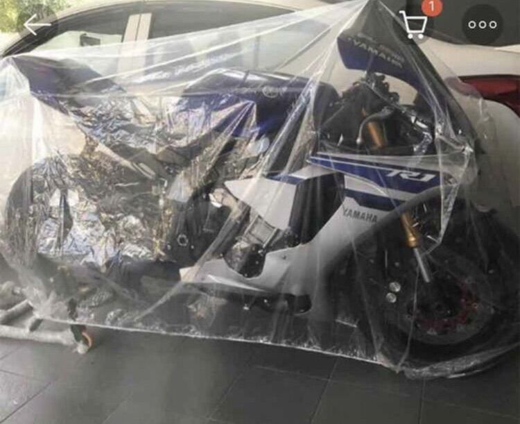 Áo trùm xe trong suốt made in thailand