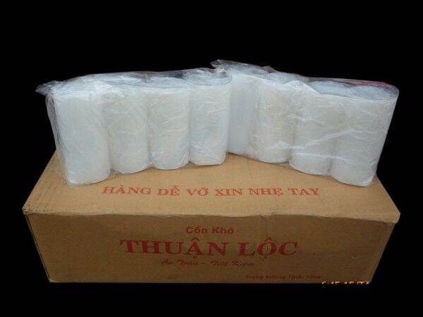 [HCM] 1kg cồn khô loại 1, viên tròn, trong suốt, đóng gói trong bao bì nhựa, đặt trên lá cây xanh, nền gỗ.