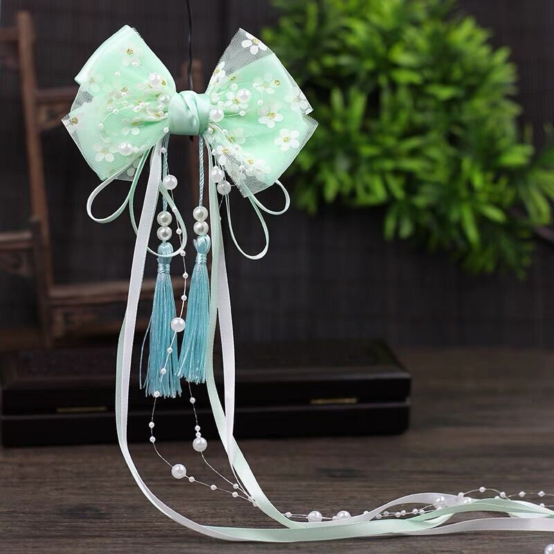 Kẹp nơ cổ trang cách điệu dây hạt trai