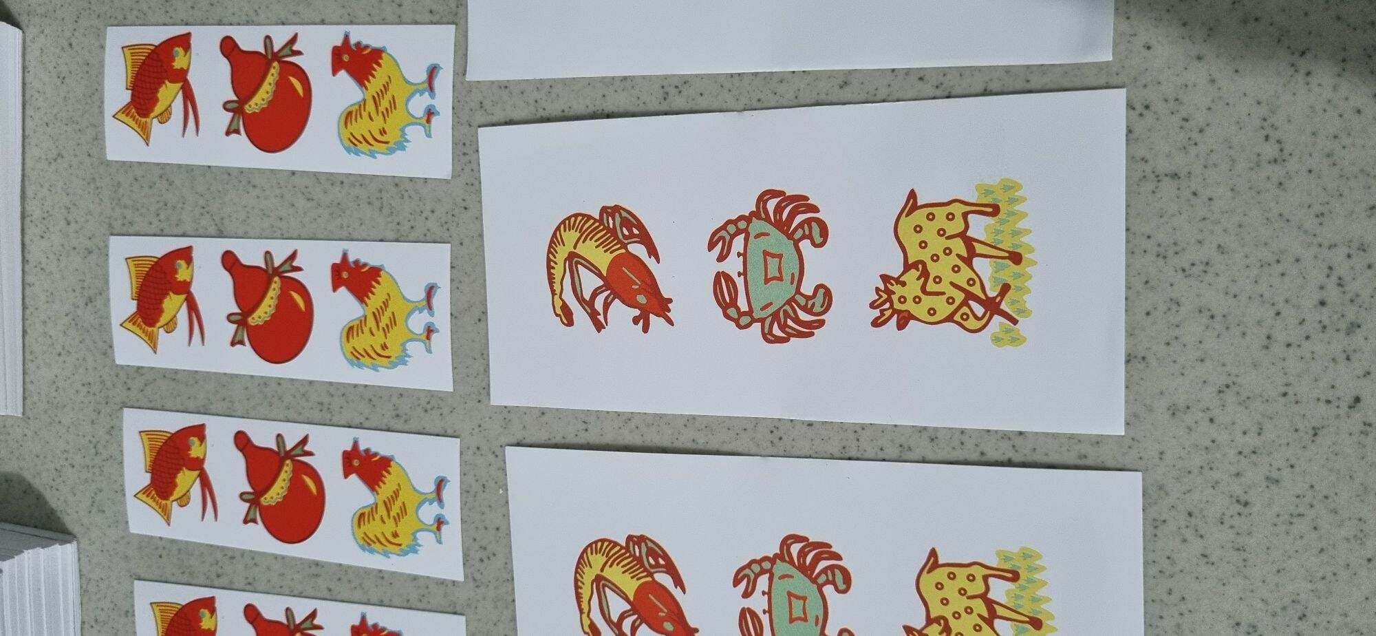 tem dán hột bầu cua.(24-28 li) 10 bộ. dán 30 hột