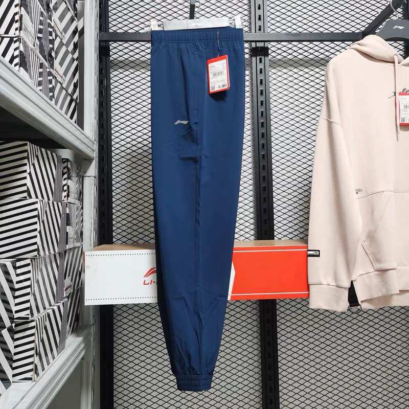 Quần gió nam Lining AYKR859