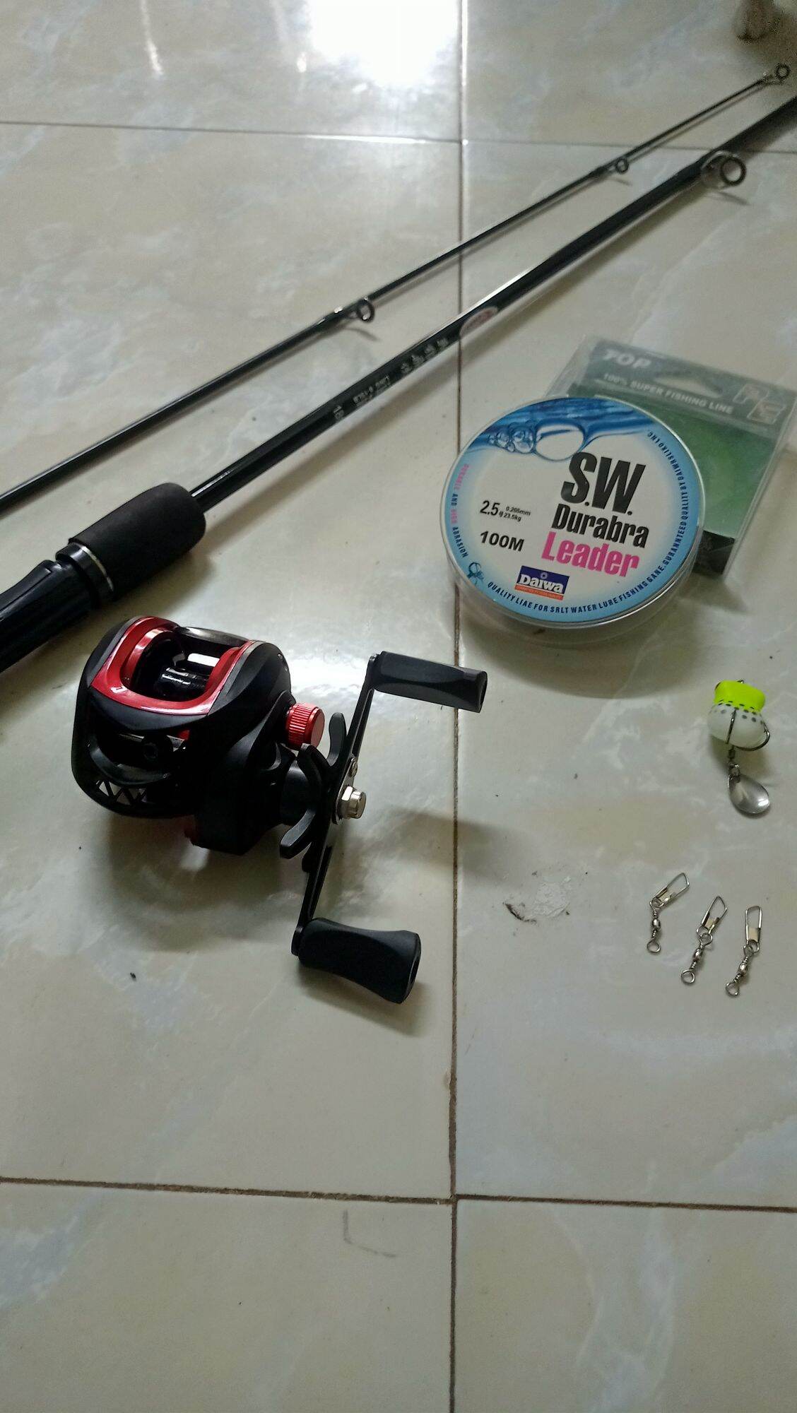 Combo cần câu lure sói đen máy ngang và phụ kiện