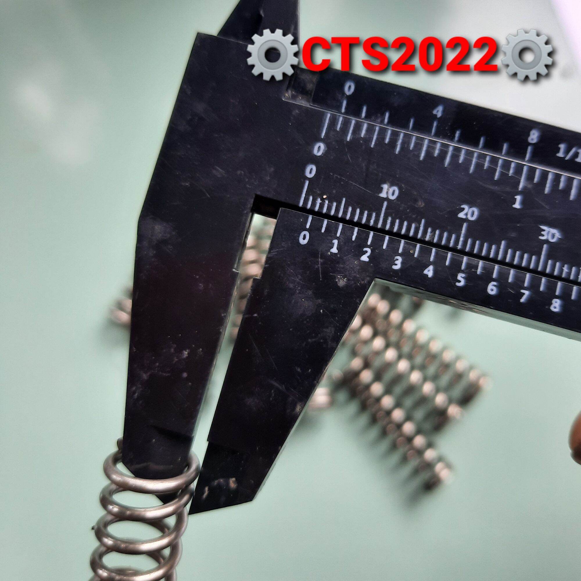 Lò xo nén phi 11.5 sợi thép 1.5 dài 40mm