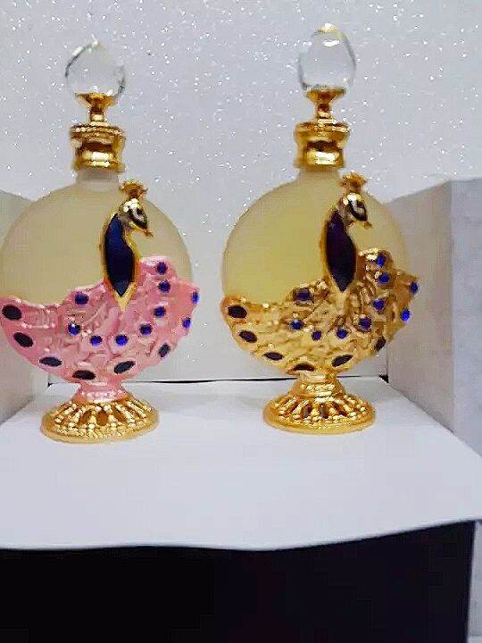 tinh dầu nước hoa dubai con công lớn 35ml , mẫu dùng thử chai bi lăn 10ml  nhỏ ngọn