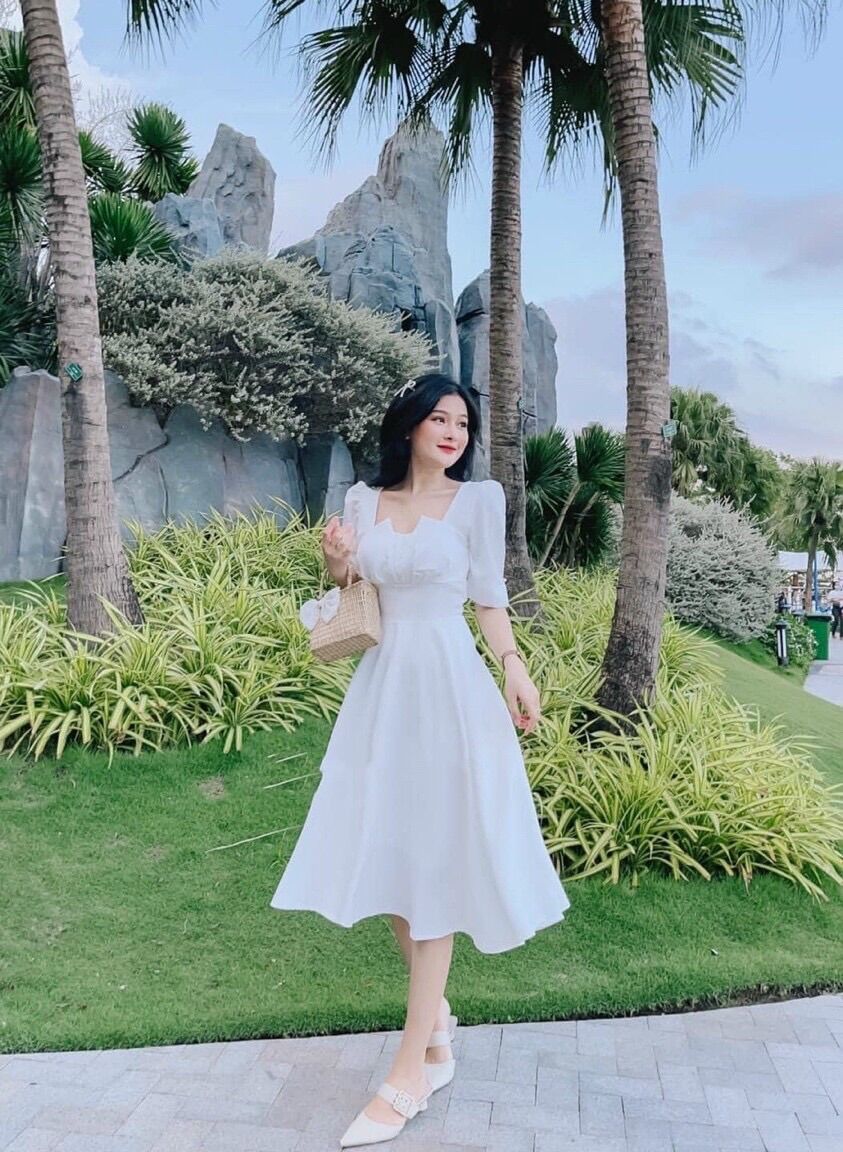 Đầm trắng dáng dài cổ cách điệu
