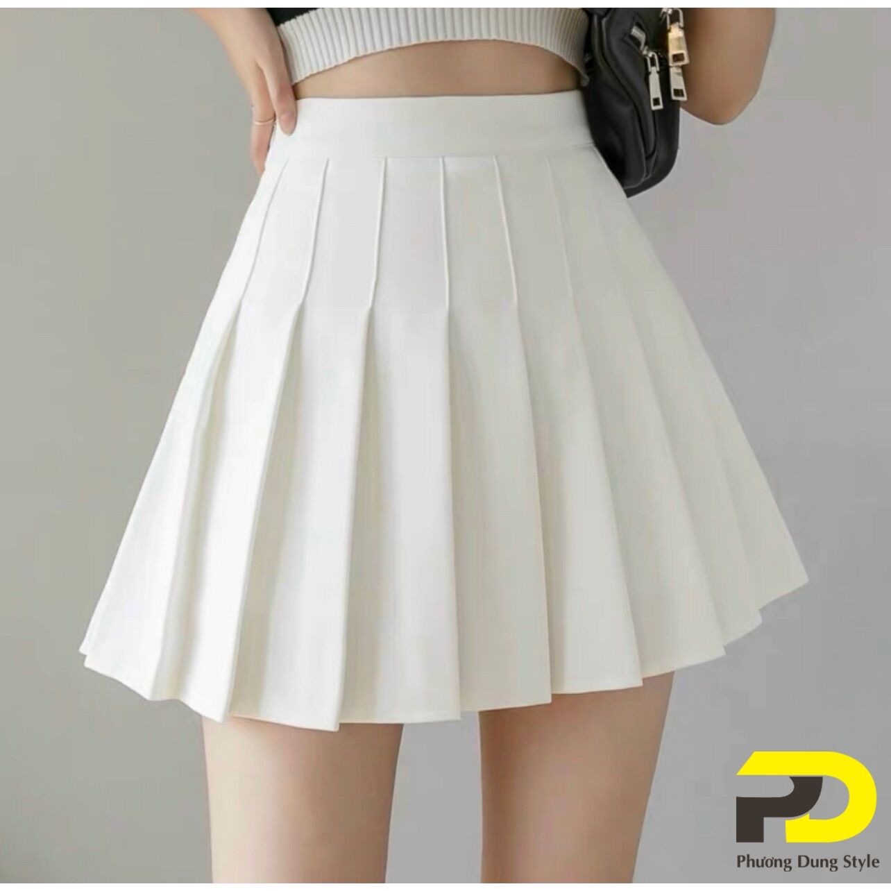 Chân váy tennis xếp ly đen trắng