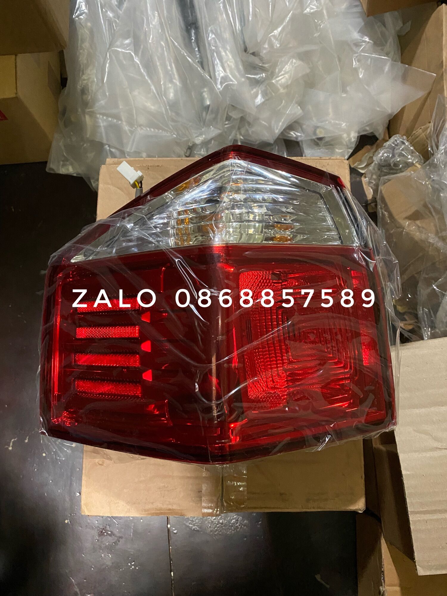 Đèn hậu ngoài Orlando xịn Gm