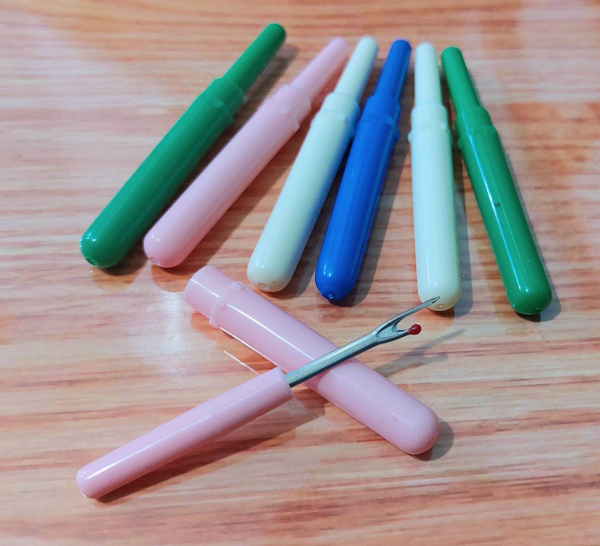 Cây tháo chỉ , rọc khuy