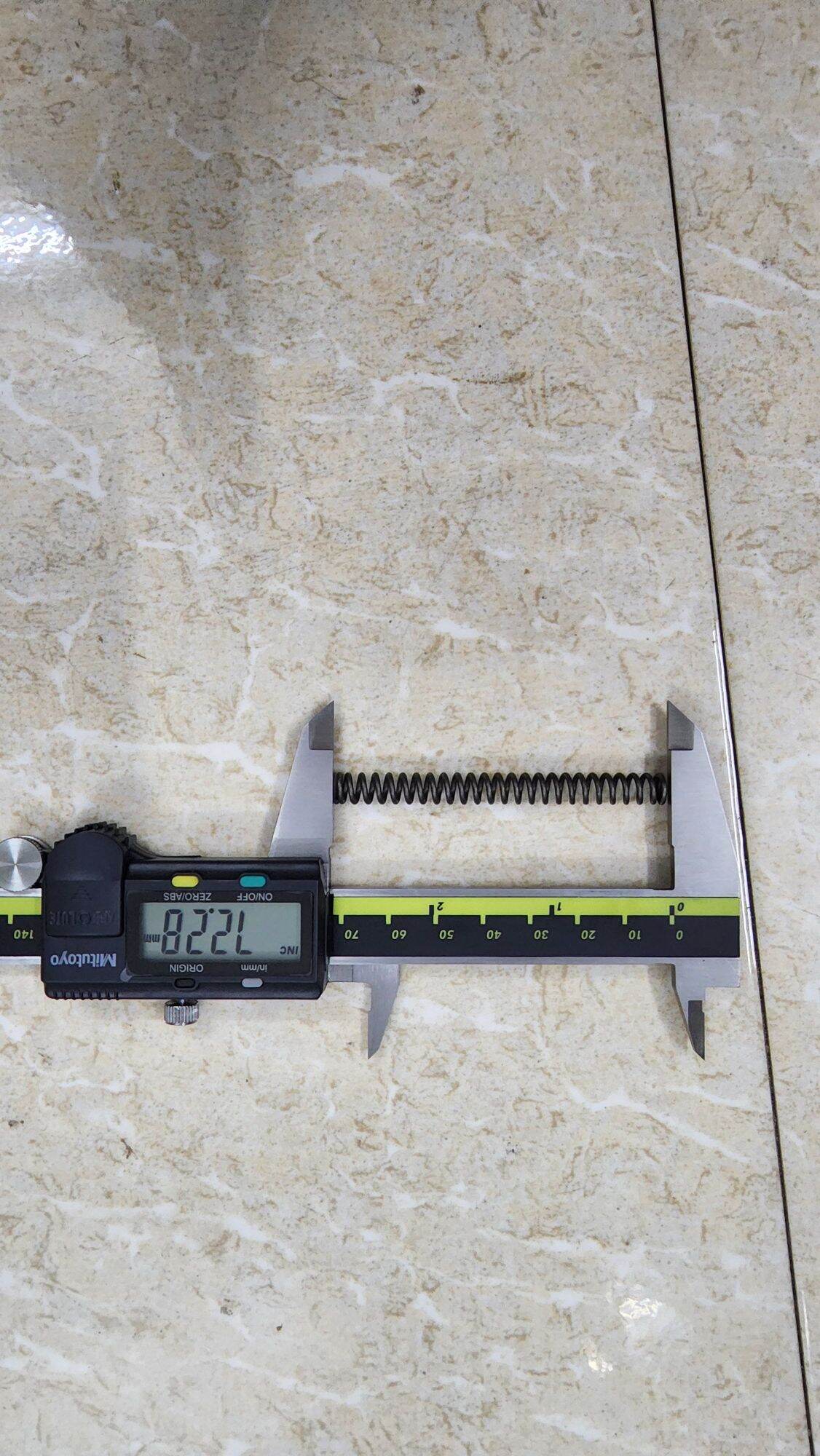 Lò xo phi 7 sợi 1.3 dài 6cm và 7cm