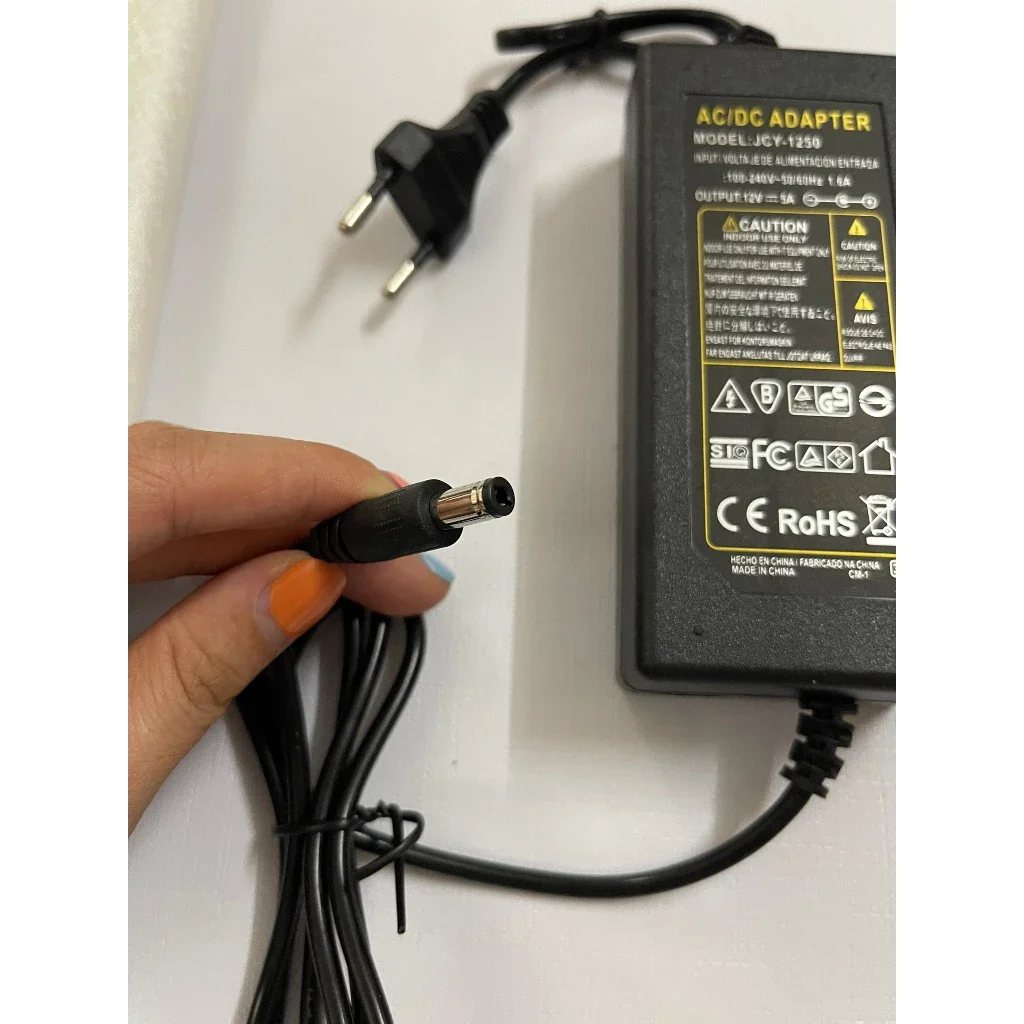 Nguồn 12V-5A Nguồn adapter Dùng Cho Máy Bơm