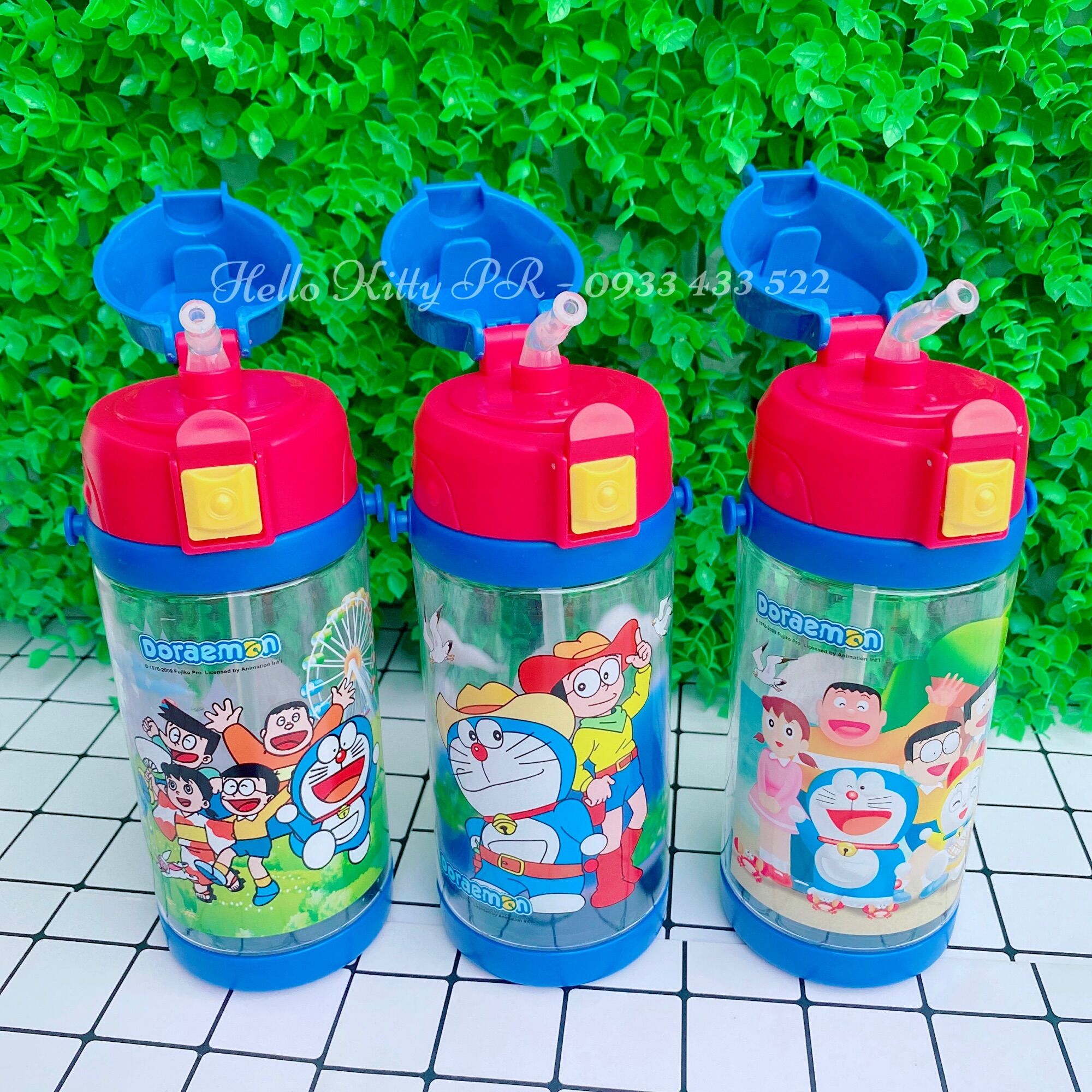 Bình nước có dây đeo Hello Kitty - Doremon Doraemon