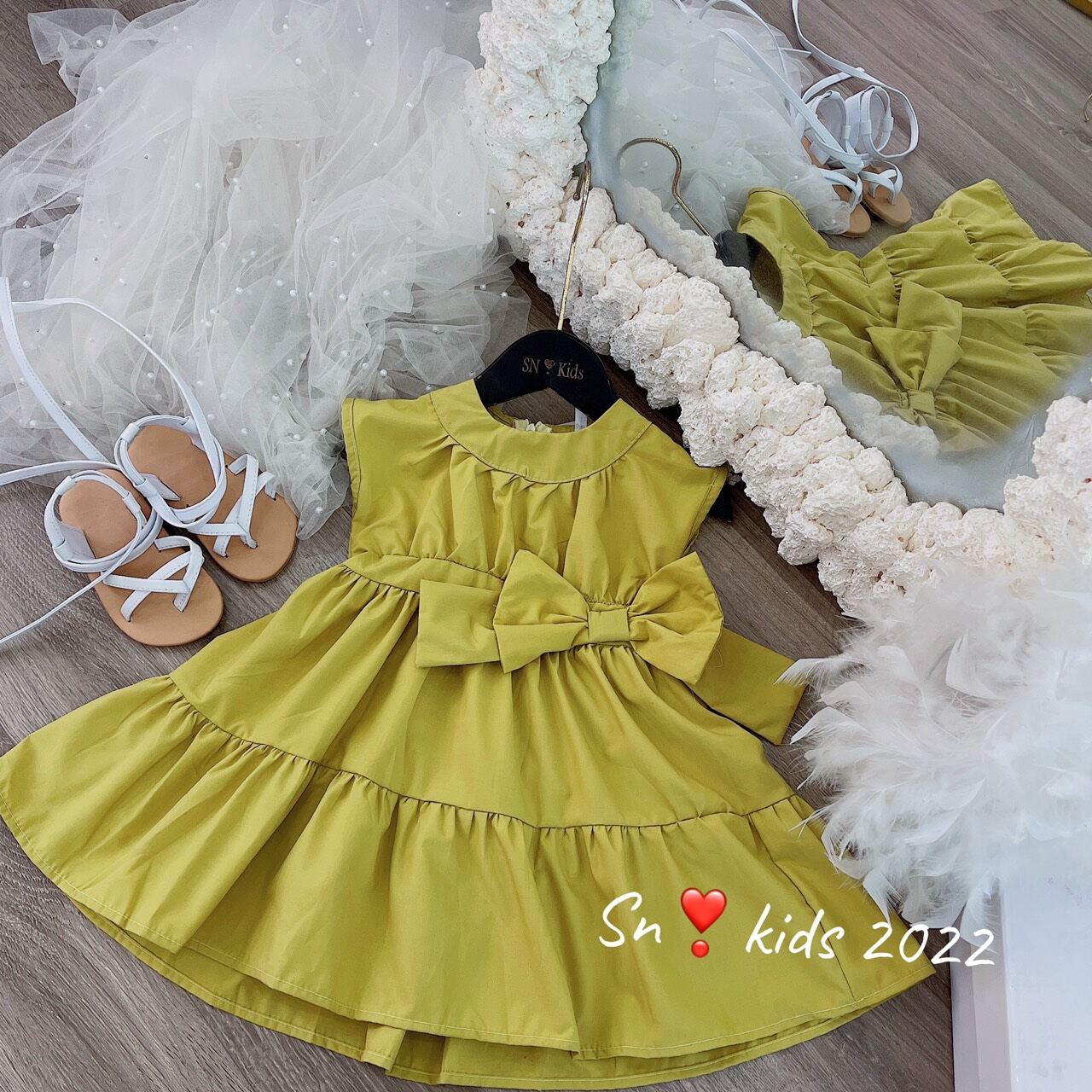 Váy thô mềm kèm nơ xinh cho bé gái