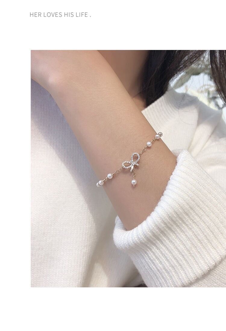 Vòng tay chuỗi ngọc đính nơ tiểu thư