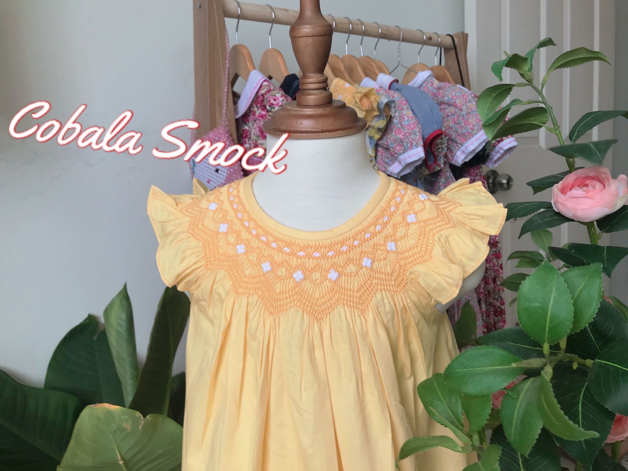 ĐẦM SMOCK CÚC VÀNG CỔ CÁNH TIÊN.