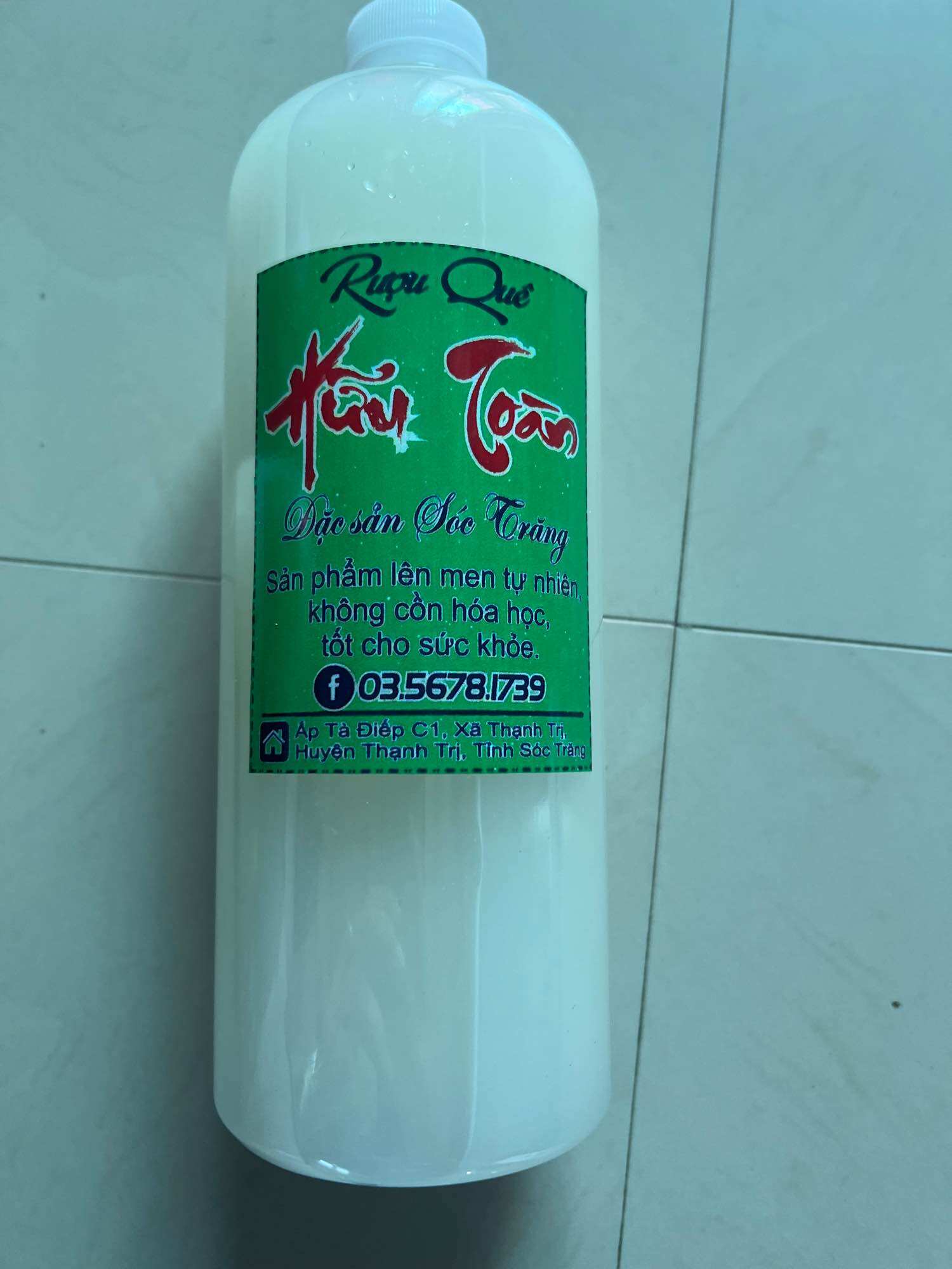 Rượu nếp sữa nhà làm, chai 1 lít 50k