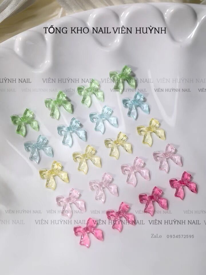 Nơ pha lê nail , set 50 cái phụ kiện gắn móng hình nơ