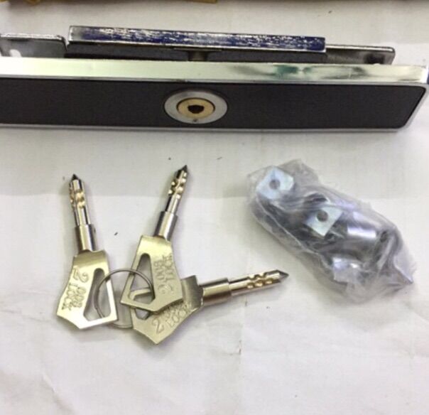 Ổ khoá cửa cuốn cơ loại tốt ( chìa khoá tròn chống trộm )